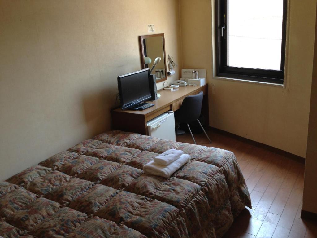 Osaka City Hotel Kyobashi Quarto foto